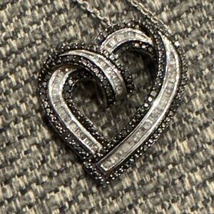 Real black & white diamond heart pendant on sterling silver